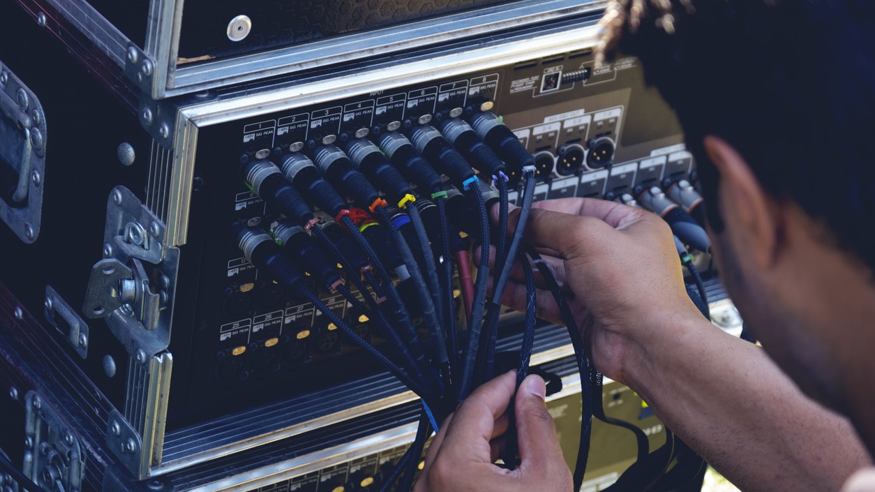 Someone working on cable connections